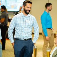 Seymour Padnos with guests at the Engineering Design Project Preview Event